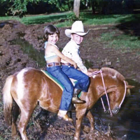 A good friend, a good horse and a mud puddle.  It just don't get any better